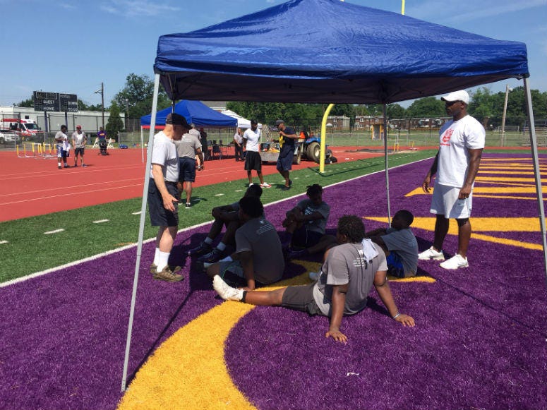 The weather might be challenging to play sports outdoors, but a group of inner-city kids endured the heat for the Woodland Community Development Corporation's fourth annual youth athletic forum. The weather might be challenging to play sports outdoors, but a group of inner-city kids endured the heat for the Woodland Community Development Corporation's fourth annual youth athletic forum.